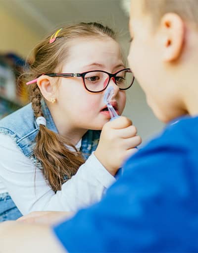 Children Playing Doctor Checking Nose With Otoscope