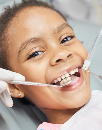 Happy Child During Dental Checkup Closeup