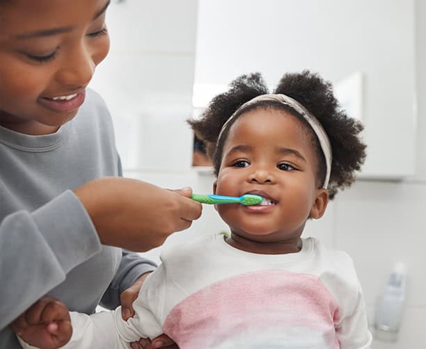 Mother Brushing Toddler Teeth Daily Oral Hygiene