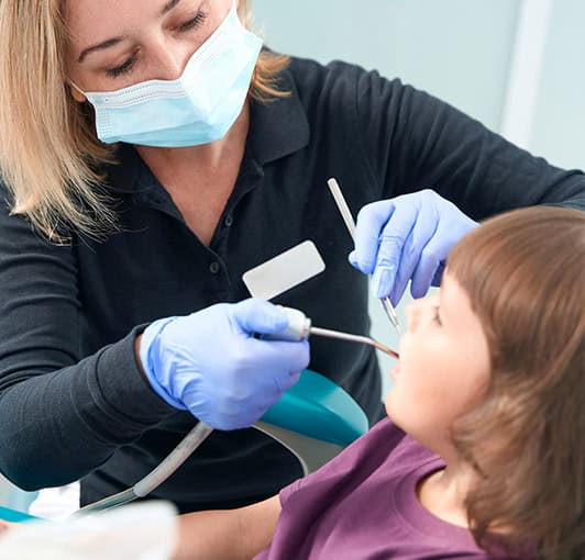 Pediatric Dentist Cleaning Child Teeth Dental Checkup